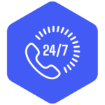 Weißes Telefonsymbol mit der Aufschrift ‚24/7‘ und umgebenden Strahlenlinien auf einem blauen, sechseckigen Hintergrund.